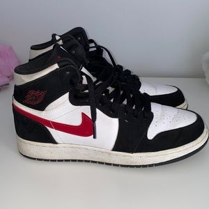 Black and white jordan 1s